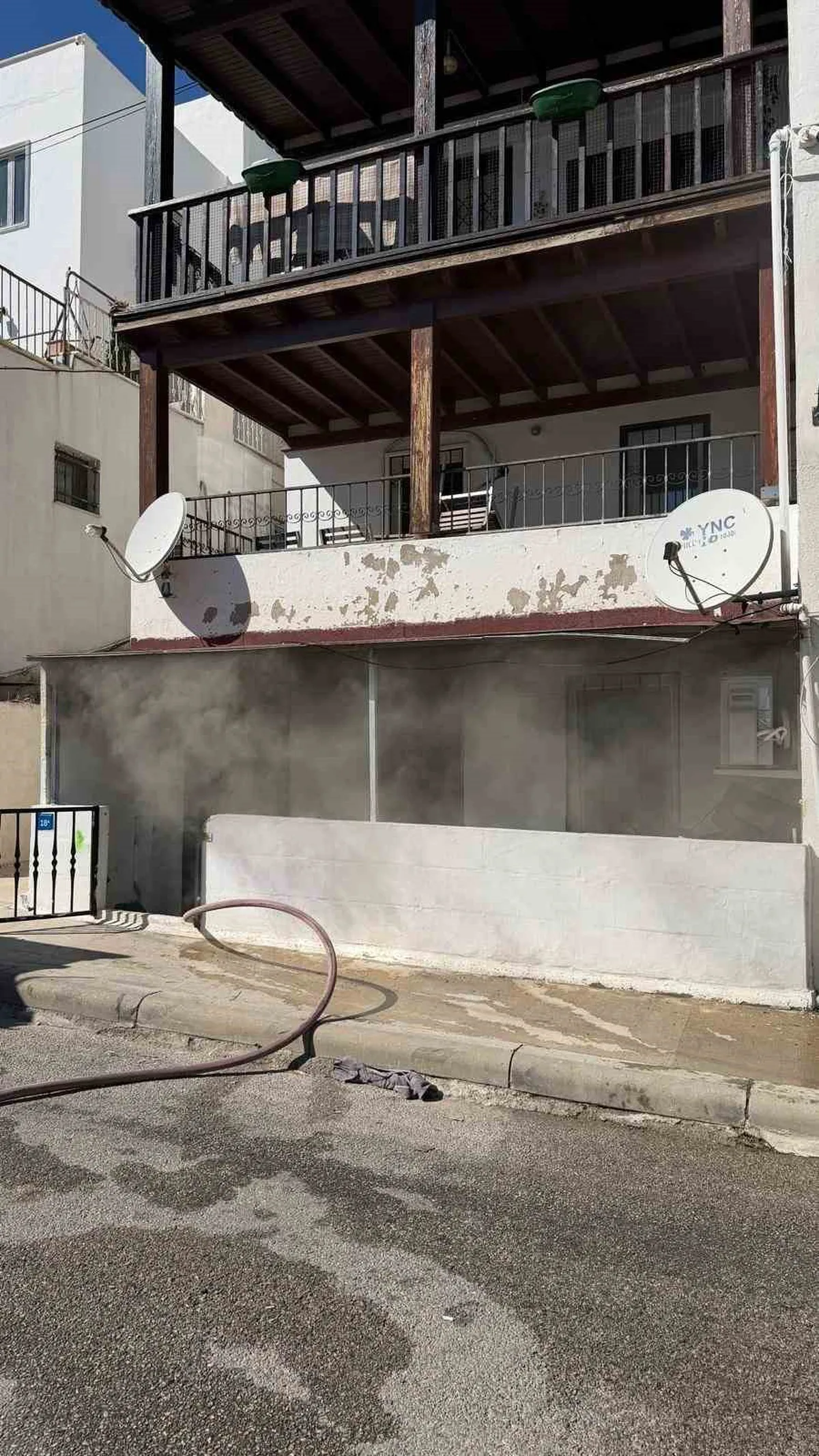 Bodrum'da 3 katlı binanın zemin katındaki dairede yangın söndürüldü, yaralı yok